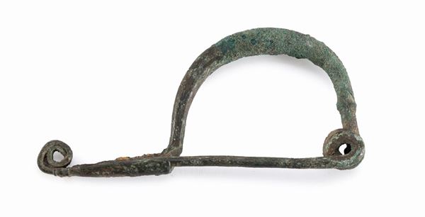 FIBULA IN BRONZO, VIII-VI SECOLO A.C.