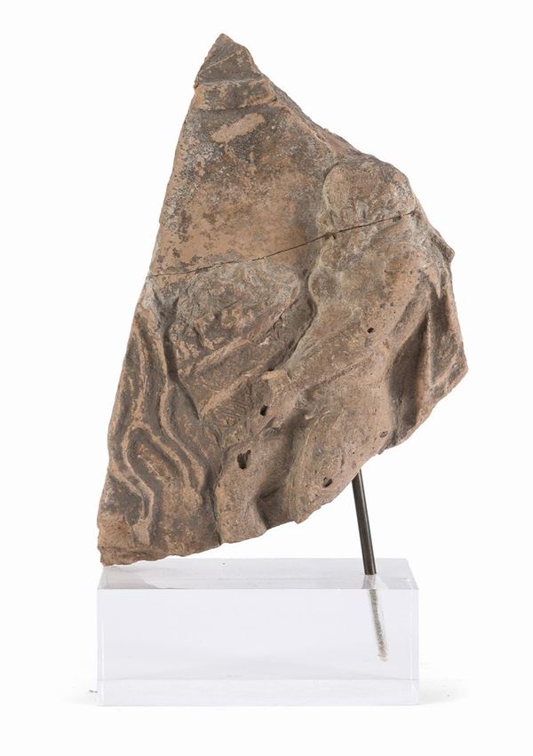 FRAMMENTO IN TERRACOTTA, I-III SECOLO D.C.
