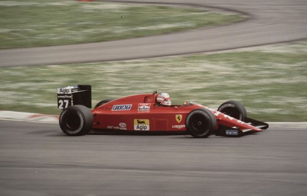 DUE FOTOGRAFIE FERRARI DI NIGEL MANSELL
