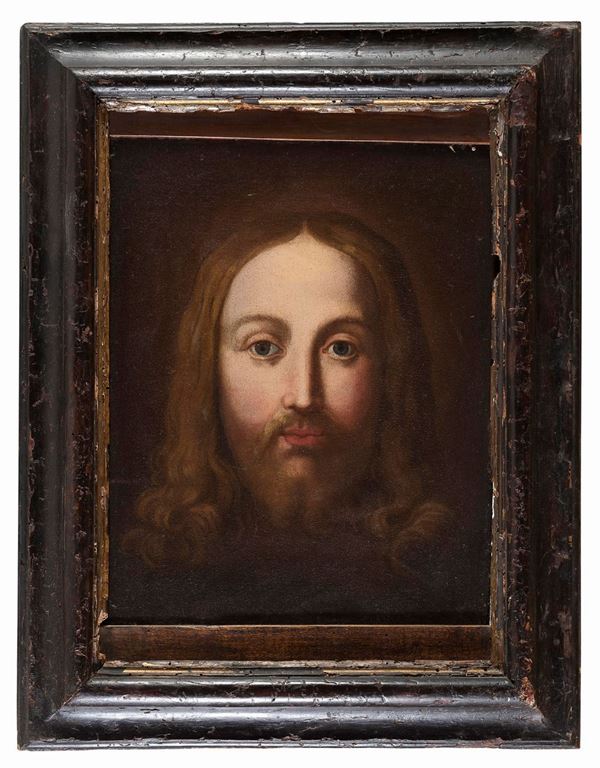 PITTORE LOMBARDO, FINE XVI, INIZI XVII SECOLO  VOLTO DI GES&Ugrave; Olio su tela, cm. 41 x 32  CONDIZIONI DEL DIPINTO Rintelo ottocentesco. Zone di restauro sul volto, linee di restauro in basso  CORNICE Cornice modanata in legno a lacca nera, del XVII secolo (supporto postumo) 