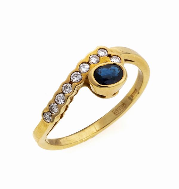 ANELLO CON BRILLANTI E ZAFFIRO