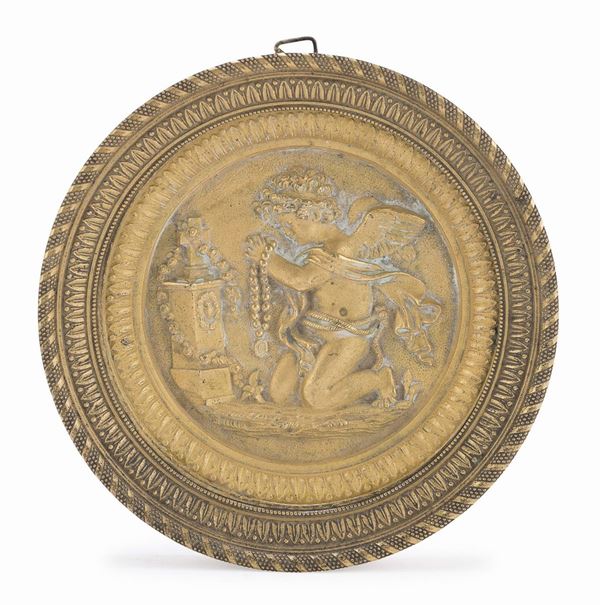 BASSORILIEVO CIRCOLARE IN BRONZO DORATO