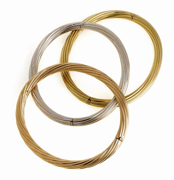 TRE BRACCIALI RIGIDI IN ORO