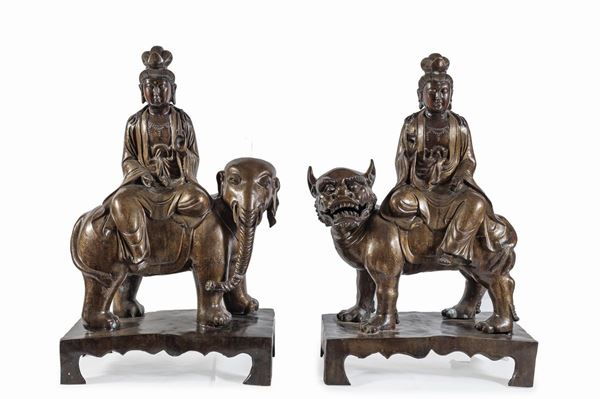 COPPIA DI BRONZI DI BODHISATTVA CON LEONE E ELEFANTE, CINA
