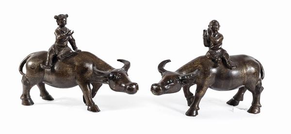 COPPIA DI BRONZI BUFALI CON BAMBINI, CINA