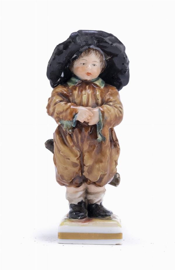 FIGURA DI BIMBO IN PORCELLANA