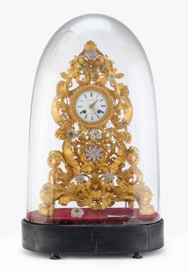 OROLOGIO IN OTTONE DORATO, XIX SECOLO