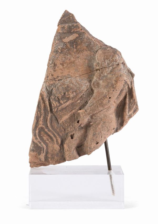 FRAMMENTO IN TERRACOTTA, I-III SECOLO D.C.