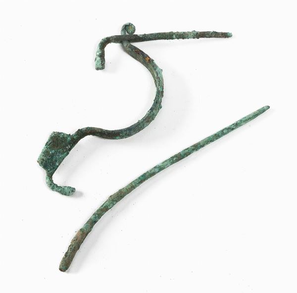 FIBULA AD ARCO IN BRONZO, VII-VI SECOLO A.C.