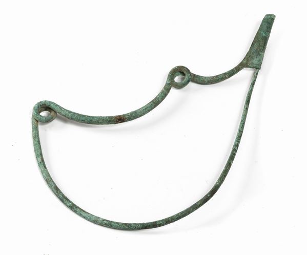 FIBULA AD ARCO IN BRONZO, VII-VI SECOLO A.C.