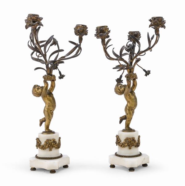 COPPIA DI PICCOLI CANDELABRI IN BRONZO