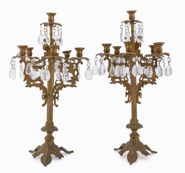 COPPIA DI CANDELABRI IN METALLO DORATO