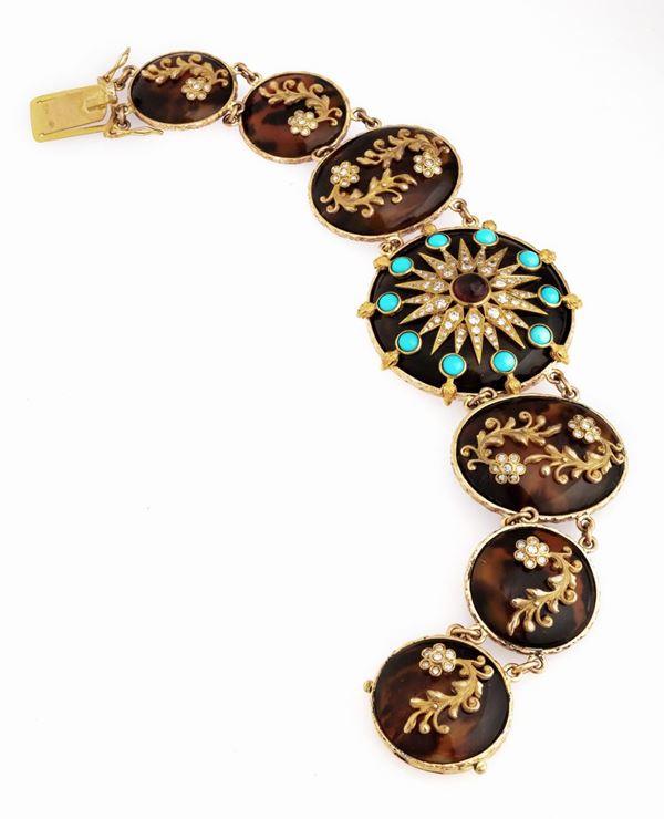 BRACCIALE CON TARTARUGA, TURCHESI, RUBINO E BRILLANTI