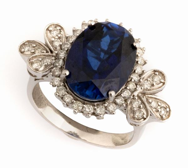 ANELLO CON BRILLANTI E PIETRA BLU