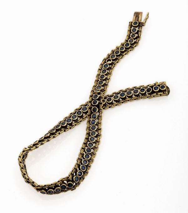 BRACCIALE IN ORO CON ZAFFIRI SCURI