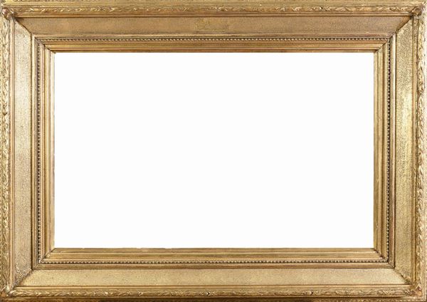 CORNICE IN LEGNO E STUCCHI DORATI