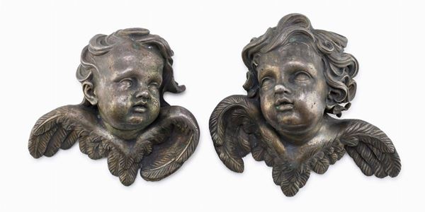 COPPIA DI TESTE DI CHERUBINI IN BRONZO, ROMA FINE XVII SECOLO