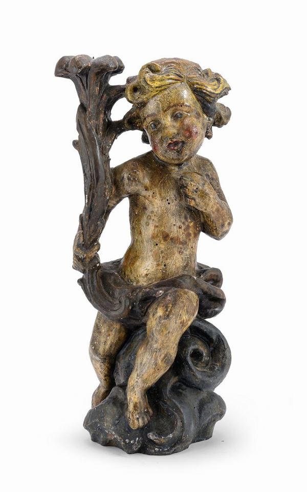 CANDELIERE CON AMORINO IN LEGNO LACCATO DEL SEICENTO