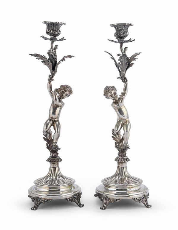 COPPIA DI CANDELIERI IN ARGENTO, ITALIA 1930 ca.
