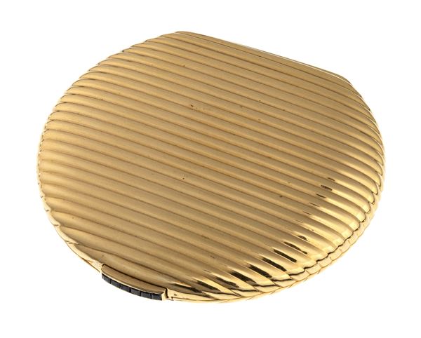 PORTA CIPRIA IN ORO CON ZAFFIRI