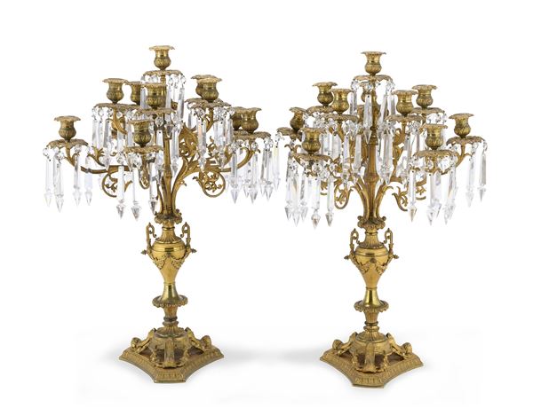 COPPIA DI CANDELABRI IN METALLO DORATO