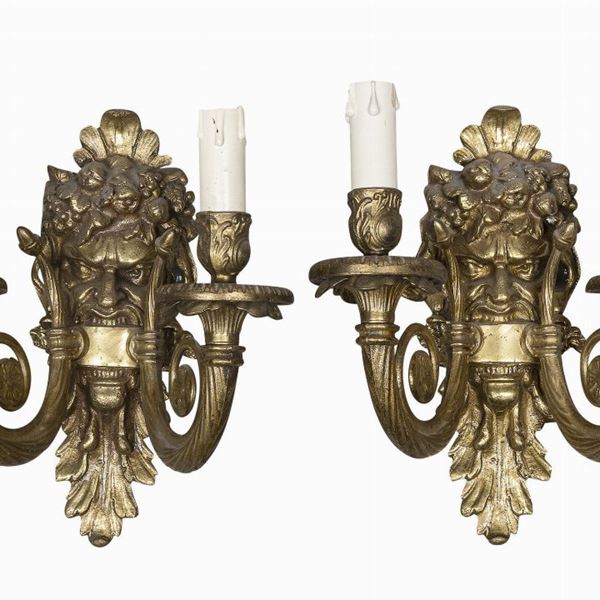 COPPIA DI APPLIQUE IN BRONZO DORATO