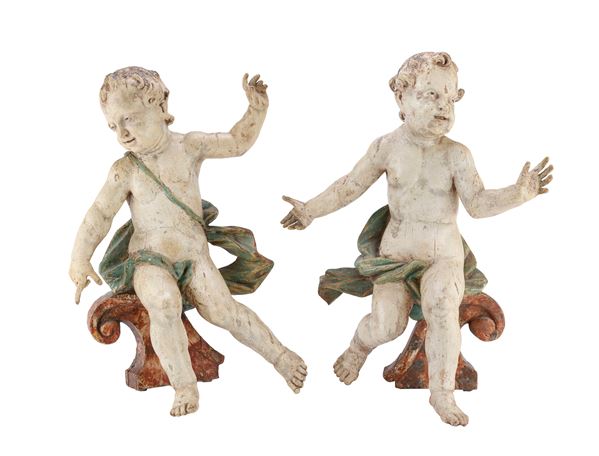 COPIA DI PUTTI IN LEGNO LACCATO, ITALIA CENTRALE XVIII SECOLO