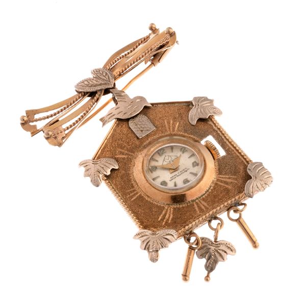 SPILLA CON OROLOGIO