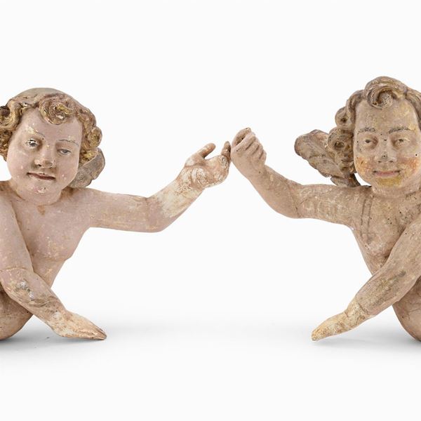 COPPIA DI CHERUBINI IN LEGNO LACCATO, XVIII SECOLO