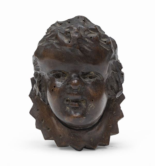 PICCOLA TESTA DI PUTTO LIGNEA, XVIII SECOLO