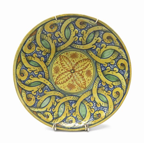 PIATTO IN MAIOLICA ISPANO-MORESCO