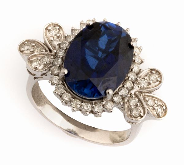 ANELLO CON BRILLANTI E PIETRA BLU