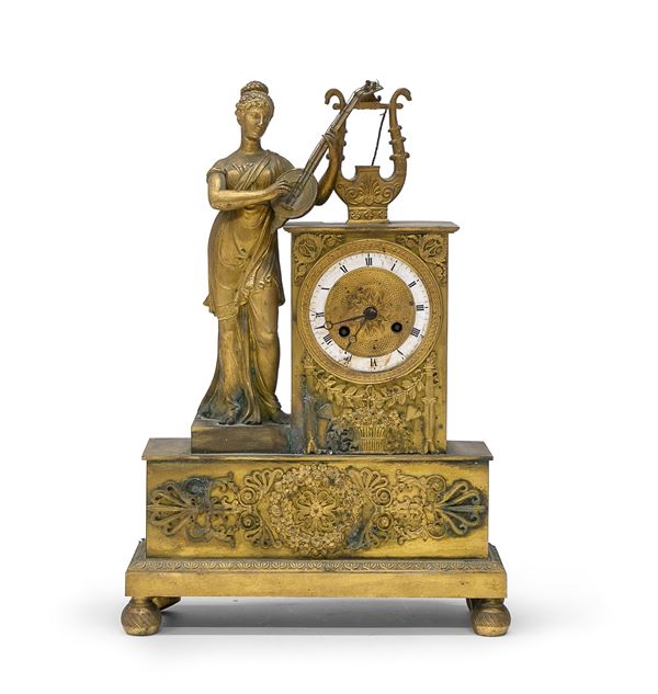 OROLOGIO IN BRONZO DORATO, INIZI XIX SECOLO