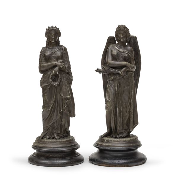 COPPIA DI SCULTURE IN METALLO BRUNITO, XIX SECOLO