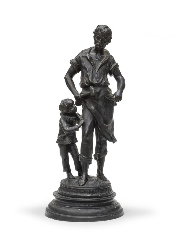 SCULTURA DI FABBRO IN CERAMICA A FINTO BRONZO