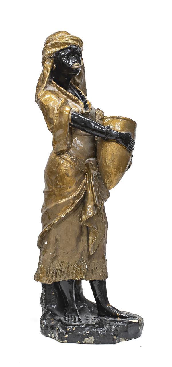 SCULTURA IN CERAMICA ARABA PORTATRICE