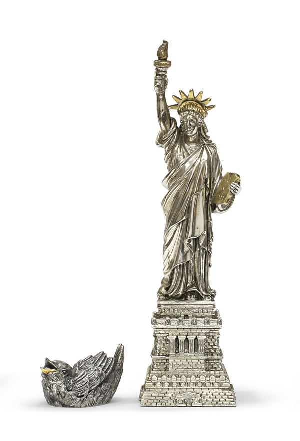 DUE SCULTURE PLACCATE IN ARGENTO, XX SECOLO
