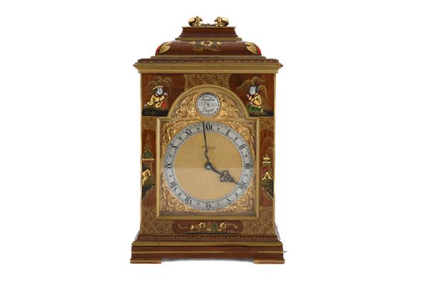 OROLOGIO DA TAVOLO IN LEGNO LACCATO, XX SECOLO