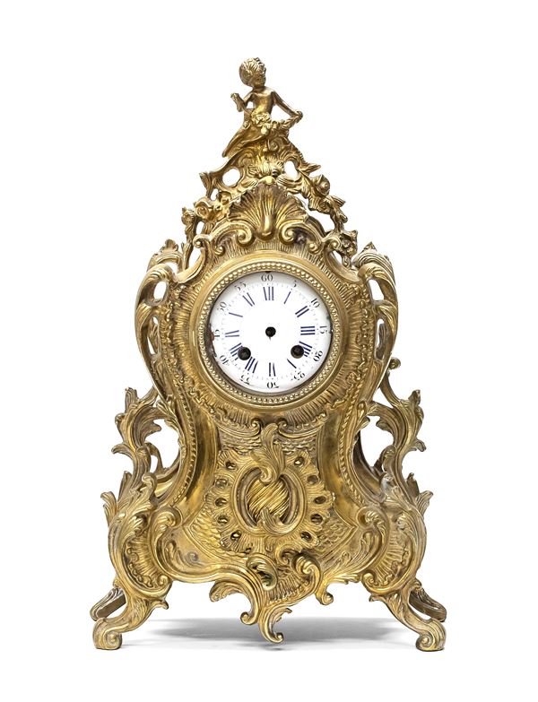 OROLOGIO DA TAVOLO IN BRONZO DORATO, XIX SECOLO