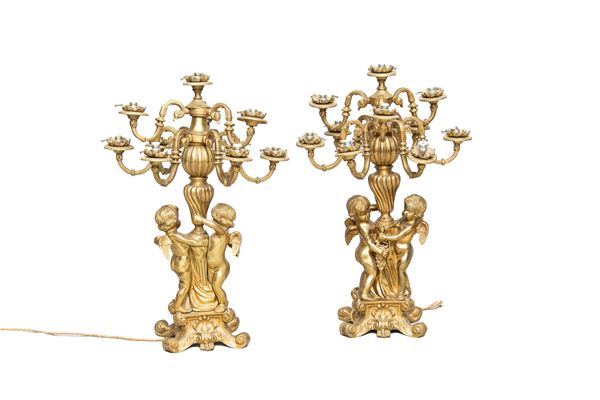 COPPIA DI CANDELABRI IN BRONZO DORATO, INIZIO XX SECOLO